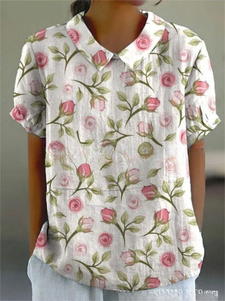 Comfortable women's floral blouse, relaxed fit with elegant print, a versatile top for spring/summer wear.