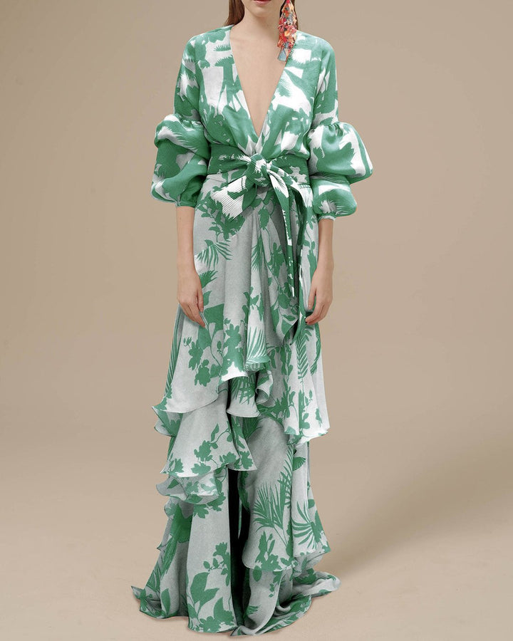 Statement floral ruffle maxi dress for women, featuring a stylish belt & long sleeves. Ideal for events.