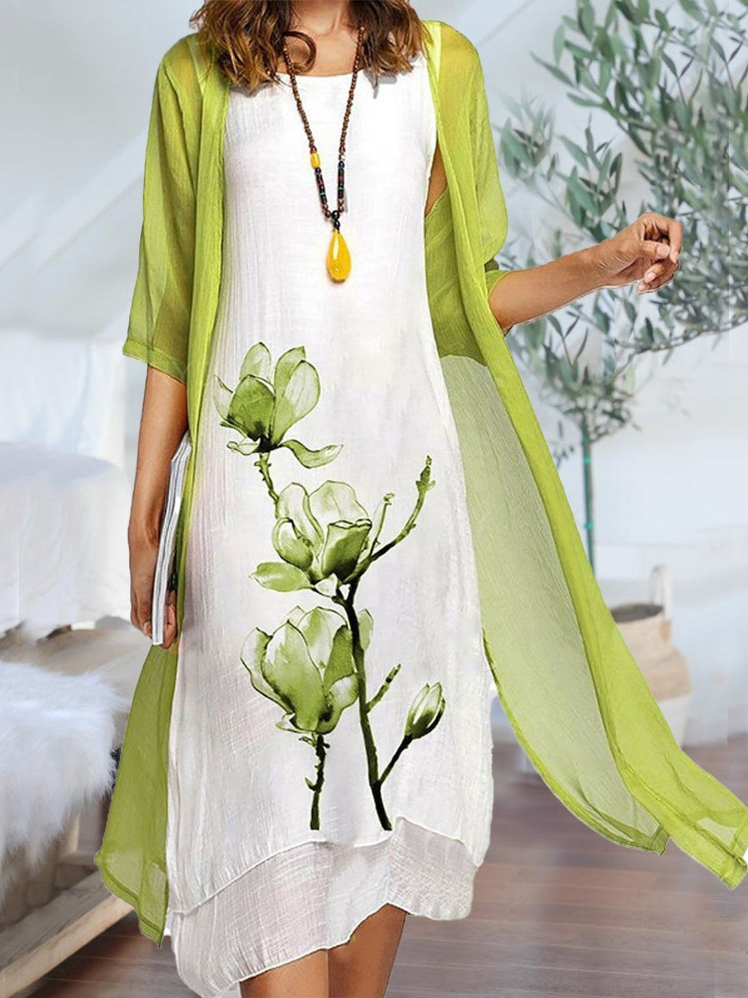 Elegant women's floral print midi dress and sheer cardigan 2-piece set, perfect for spring/summer occasions.