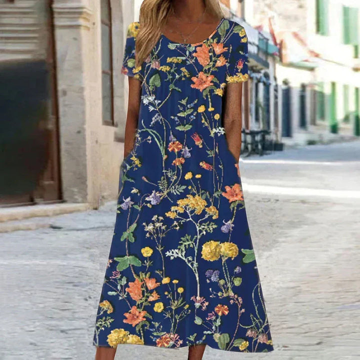 Elegant women's floral print short sleeve midi dress, perfect for summer casual wear or spring fashion.