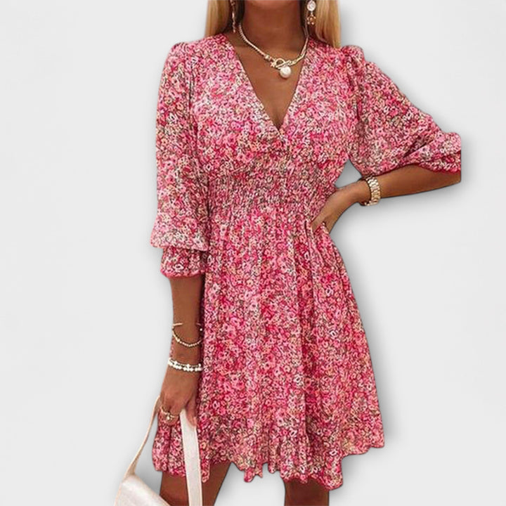 Elegant women's floral puff sleeve midi dress, perfect for summer garden parties & brunch outfits.