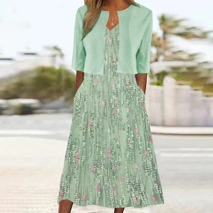 Elegant women's floral sequin midi dress & matching jacket set, perfect for wedding guests & special occasions.