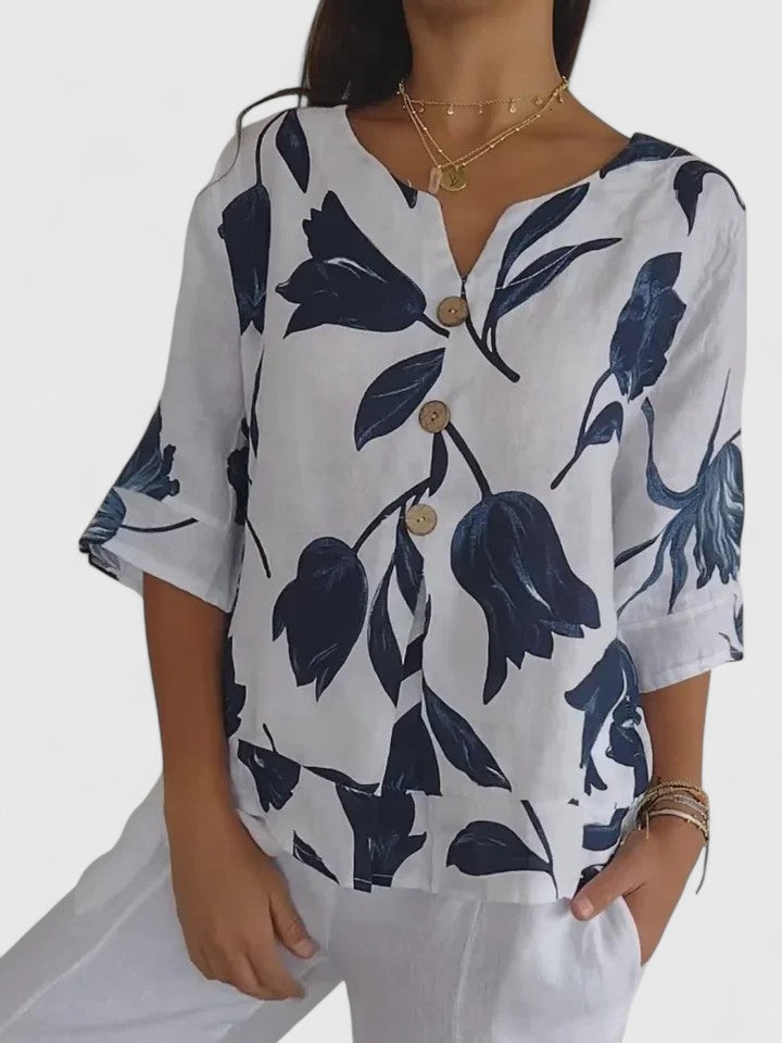 Chic women's V-neck floral blouse, an elegant and comfortable top for ladies' versatile everyday wear.