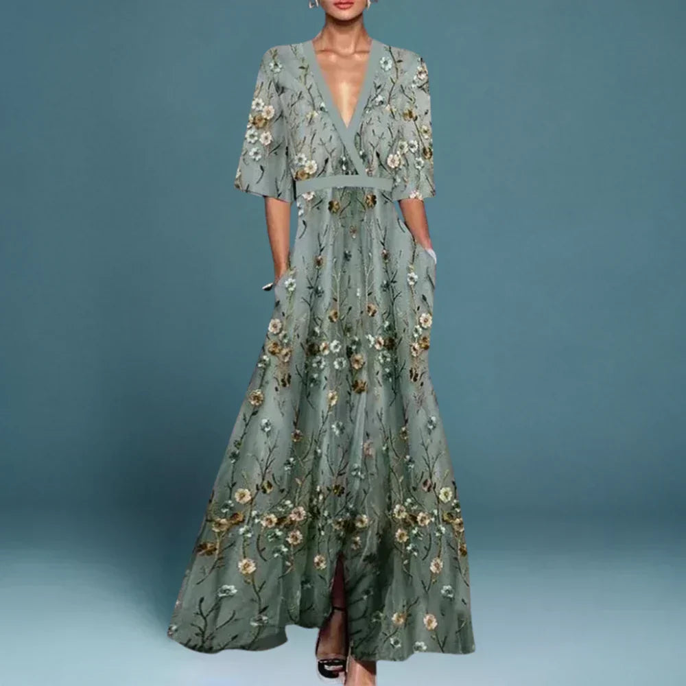 Elegant women's floral V-neck maxi dress, perfect for wedding guests or summer parties, with a flowing A-line design.