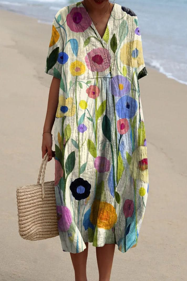 Stylish women's floral V-neck midi dress with a flattering silhouette. Perfect for summer, vacation & casual elegance.