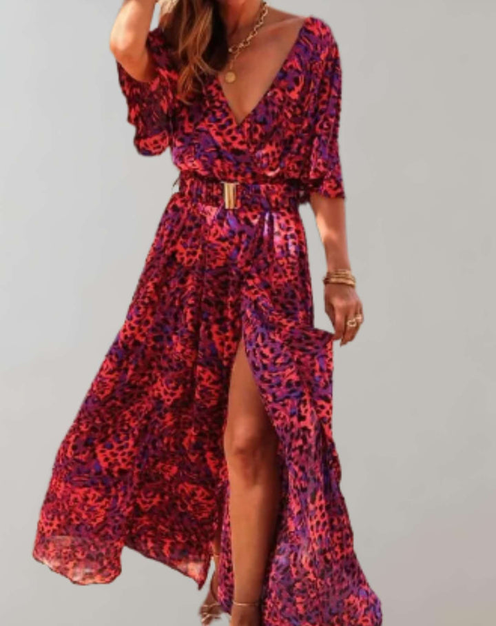 Close-up: Elegant floral wrap maxi dress detail, highlighting adjustable waist & flowy fabric for women's style.