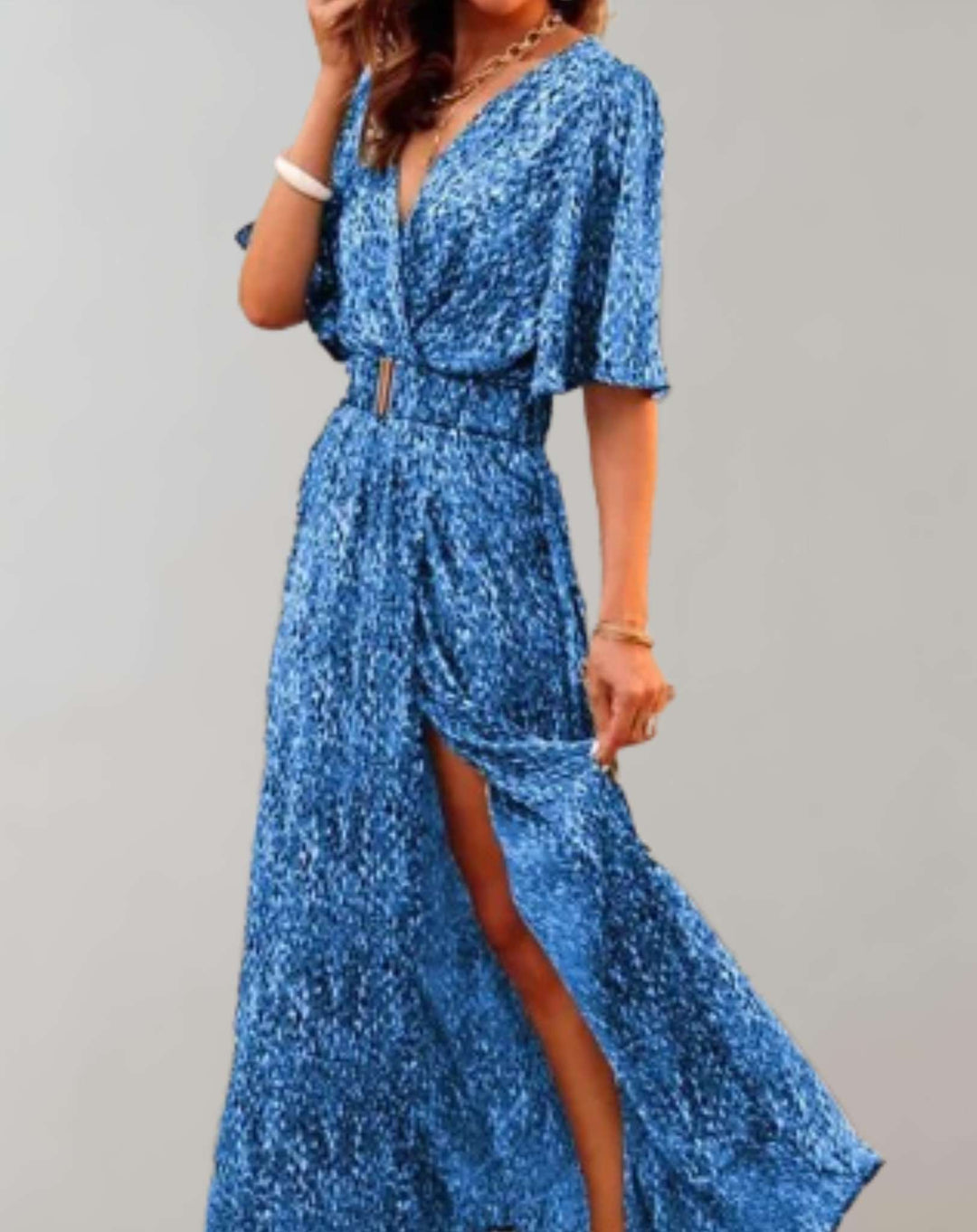 Vibrant floral pattern on flowy fabric of elegant wrap maxi dress, showcasing women's fashion & summer style.