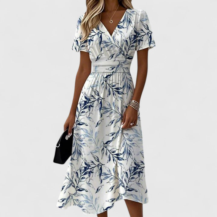 Chic women's V-neck floral wrap midi dress with flutter sleeves, a comfortable & stylish choice for summer casual wear.