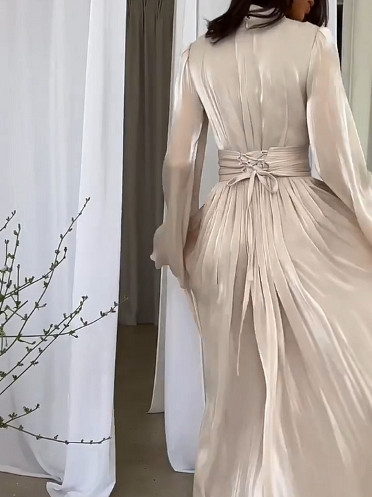 Elegant women's flowing maxi dress, perfect for summer parties & resort wear. Comfortable and stylish holiday attire.