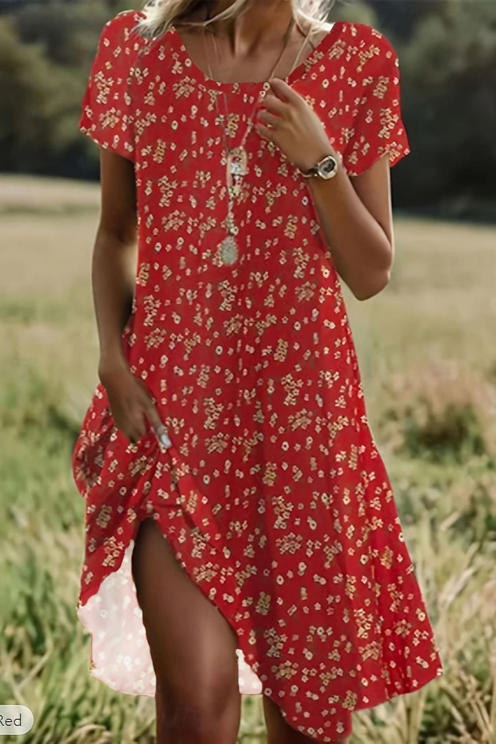 Sophisticated women's flowing midi dress with a relaxed fit, ideal for elegant formal wear and special occasions.