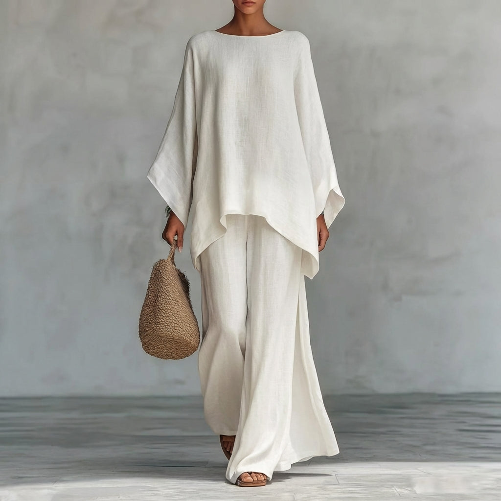 Relaxed fit women's two-piece set with a comfortable oversized tunic and a matching flowy maxi skirt for vacation.