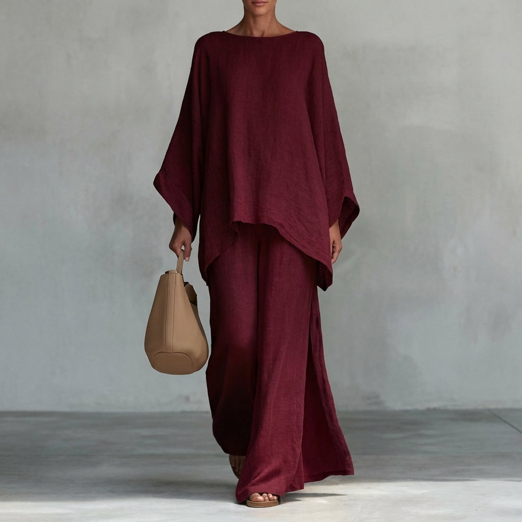 Stylish women's flowy two-piece set with an oversized tunic top & elegant maxi skirt, perfect for brunch attire.