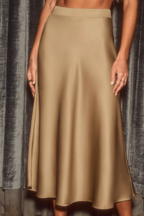 Elegant women's flowy midi skirt, A-line high waist, perfect for office or date night, sleek summer fashion.