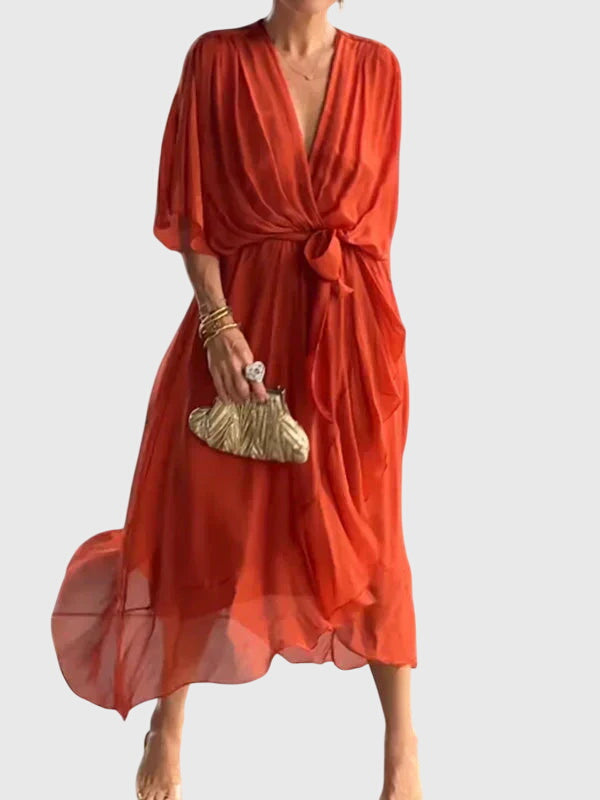 Detail of V-neck on a women's flattering flowy maxi dress, versatile for any elegant occasion.