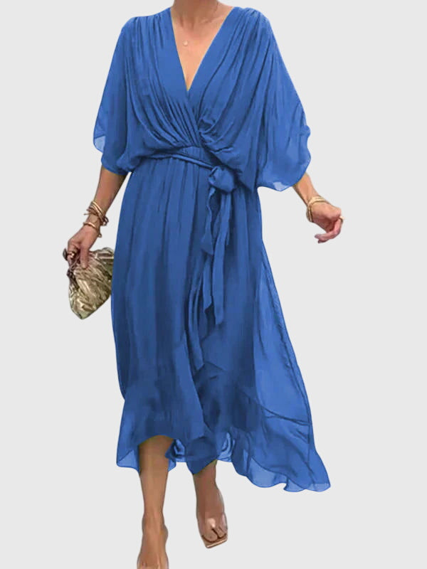 Flattering women's elegant flowy V-neck maxi dress, ideal for summer and multiple occasions.