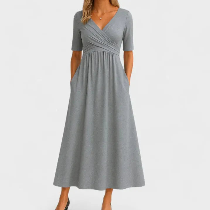 Stylish V-neck midi dress for women, a versatile elegant summer or formal wear choice for events.