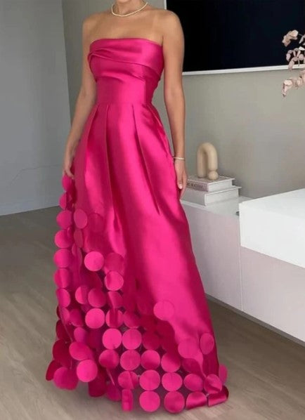 Elegant women's fuchsia strapless maxi dress. Perfect for wedding guests, galas, or formal evening events.