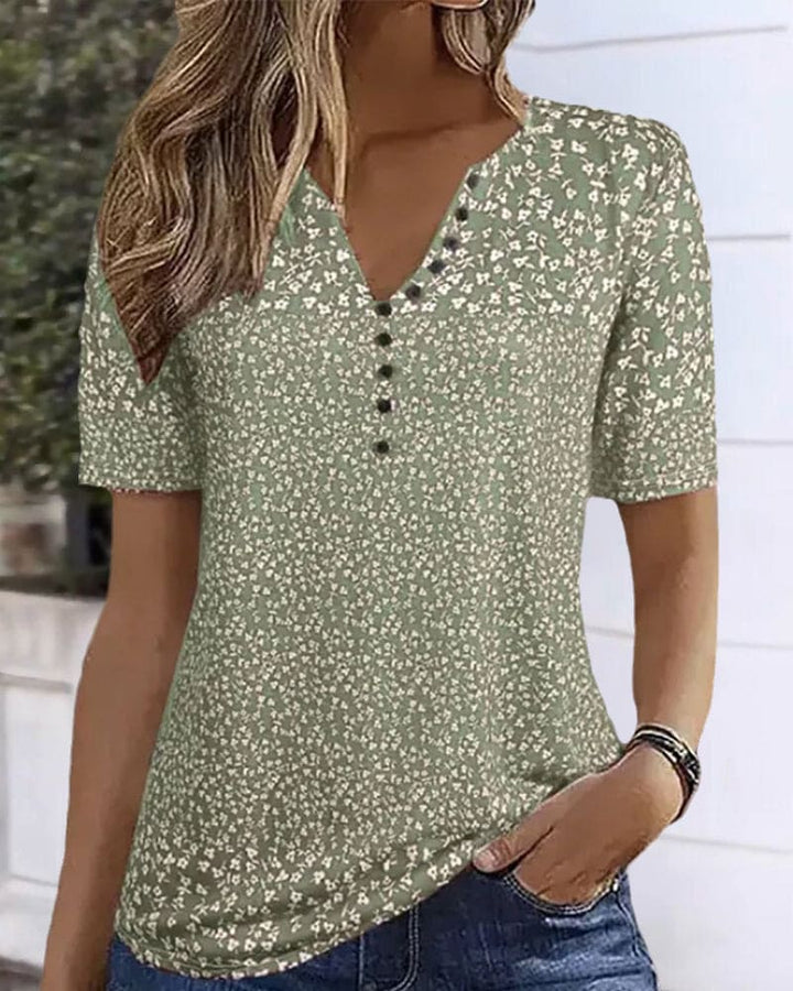 Elegant women's green floral short sleeve blouse, ideal for summer fashion and versatile casual wear.