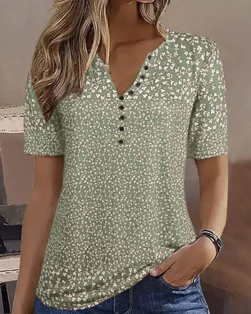 Relaxed fit women's floral summer top with short sleeves, perfect for casual elegance & comfort.