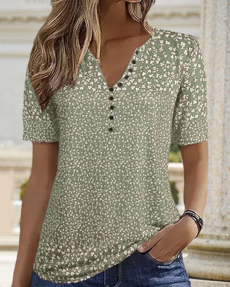 Versatile women's floral print shirt, a comfortable short sleeve top for elegant summer fashion.