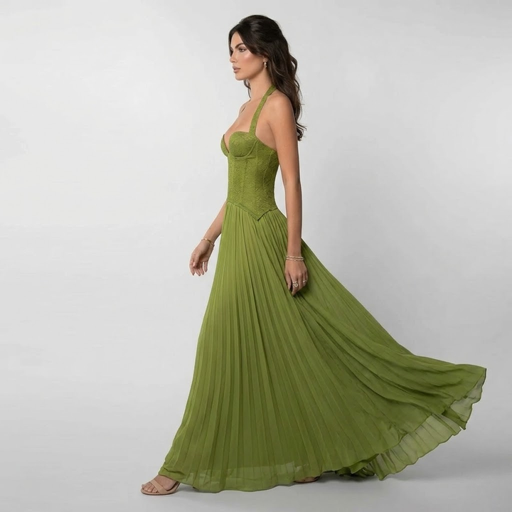 Chic women's pleated halter maxi dress in green, featuring an open back and elegant flowy design for parties.
