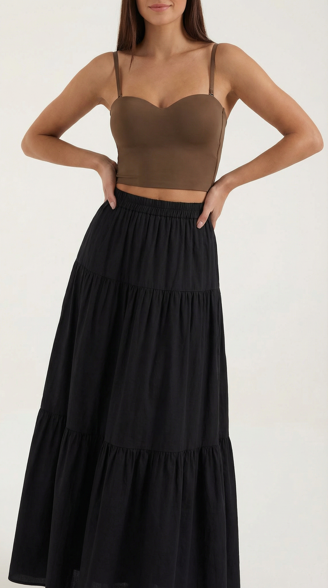 Stylish women's Guinevere tank top, elegant tailored fit, heart neckline, versatile for summer fashion.