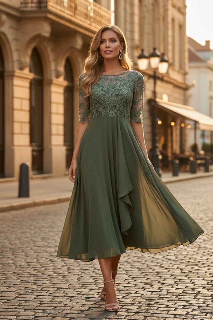 Long elegant women's half sleeve evening dress, perfect for formal events, parties & wedding guests. Timeless gown.