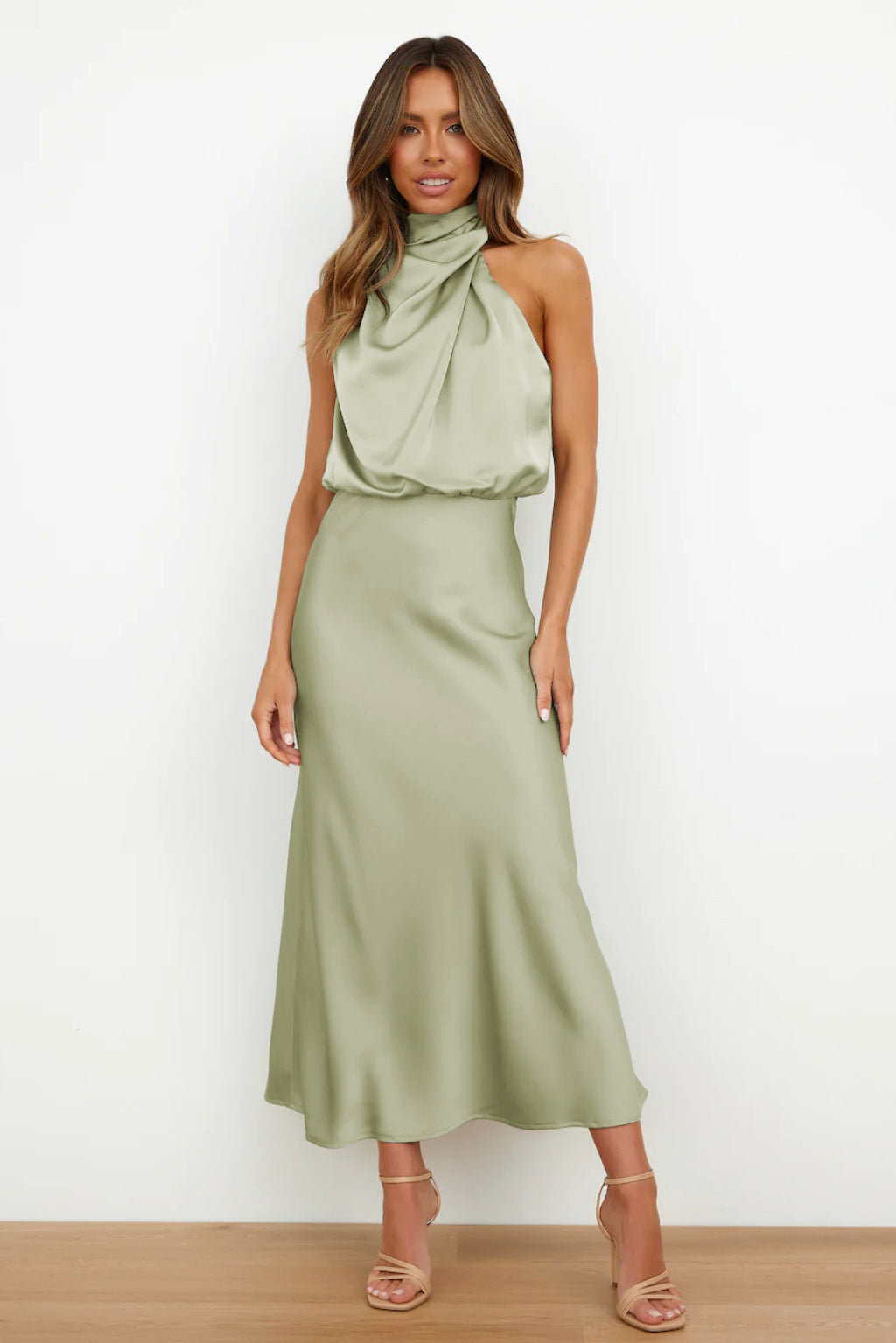 Elegant women's halter evening gown with open back, perfect for formal events & special occasions.
