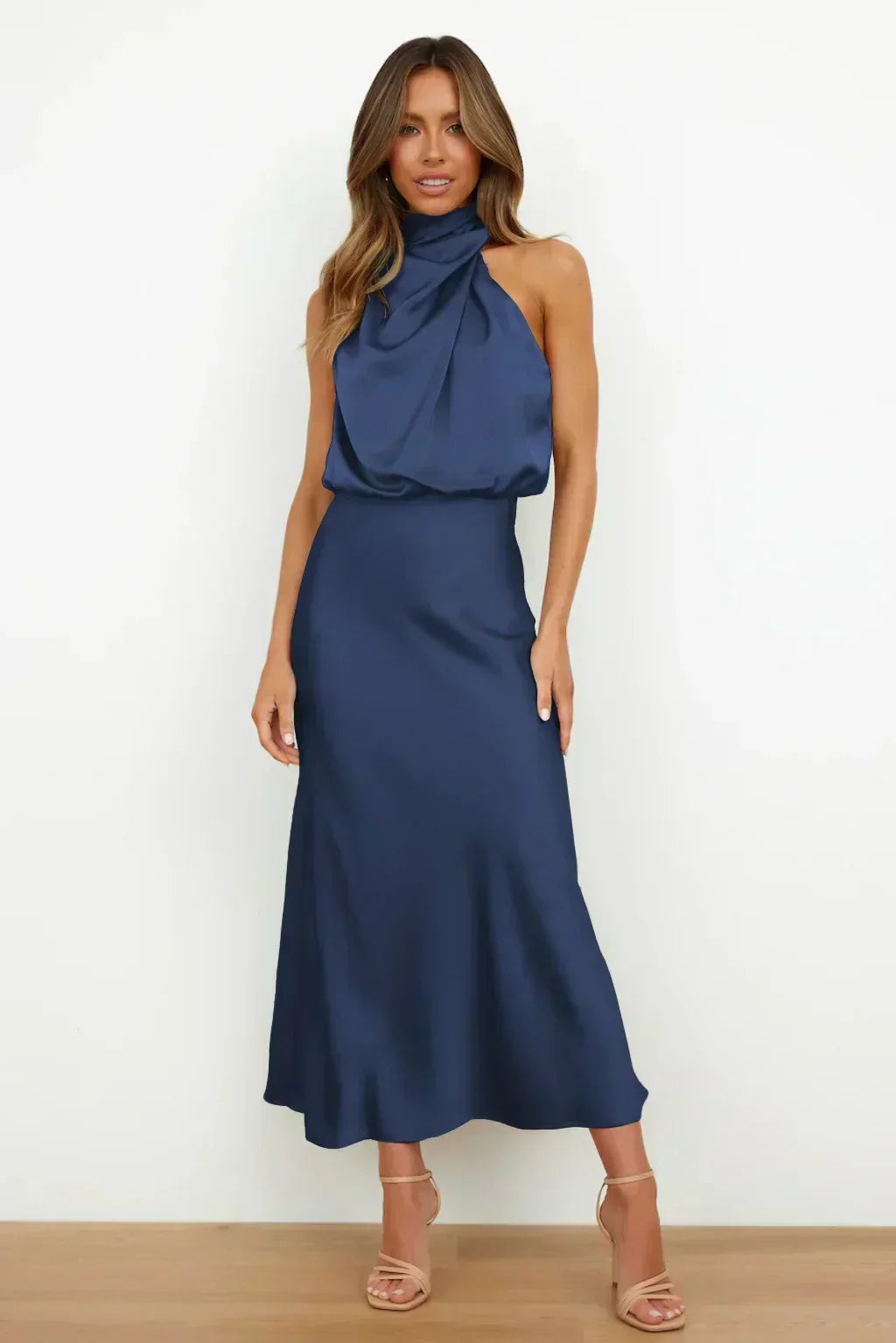 Elegant women's halter evening dress, a sophisticated open back gown for formal wear.