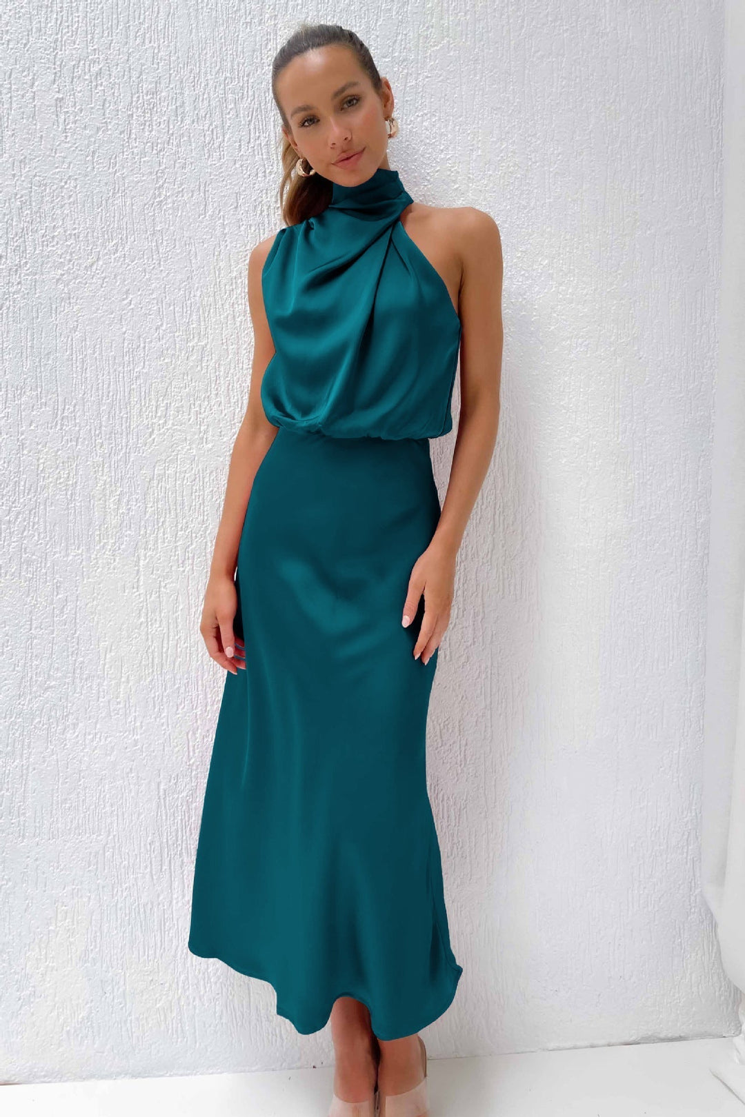 Simple yet elegant women's halter evening dress, a sophisticated open back formal gown.