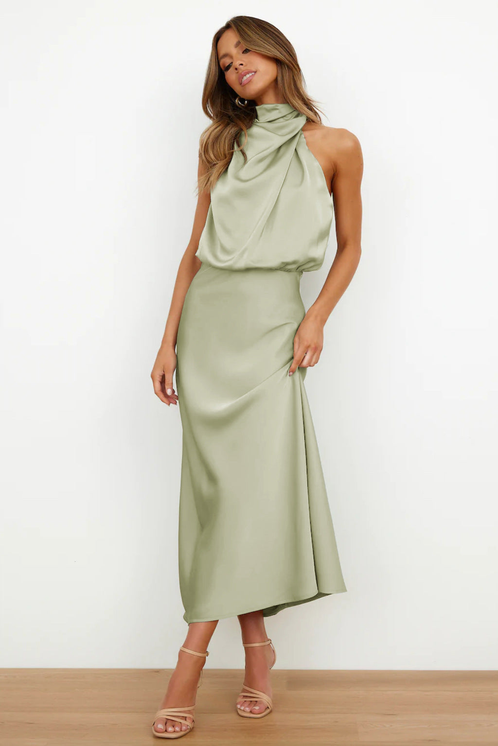Sophisticated open back halter dress detail, ideal for wedding guests & prom.