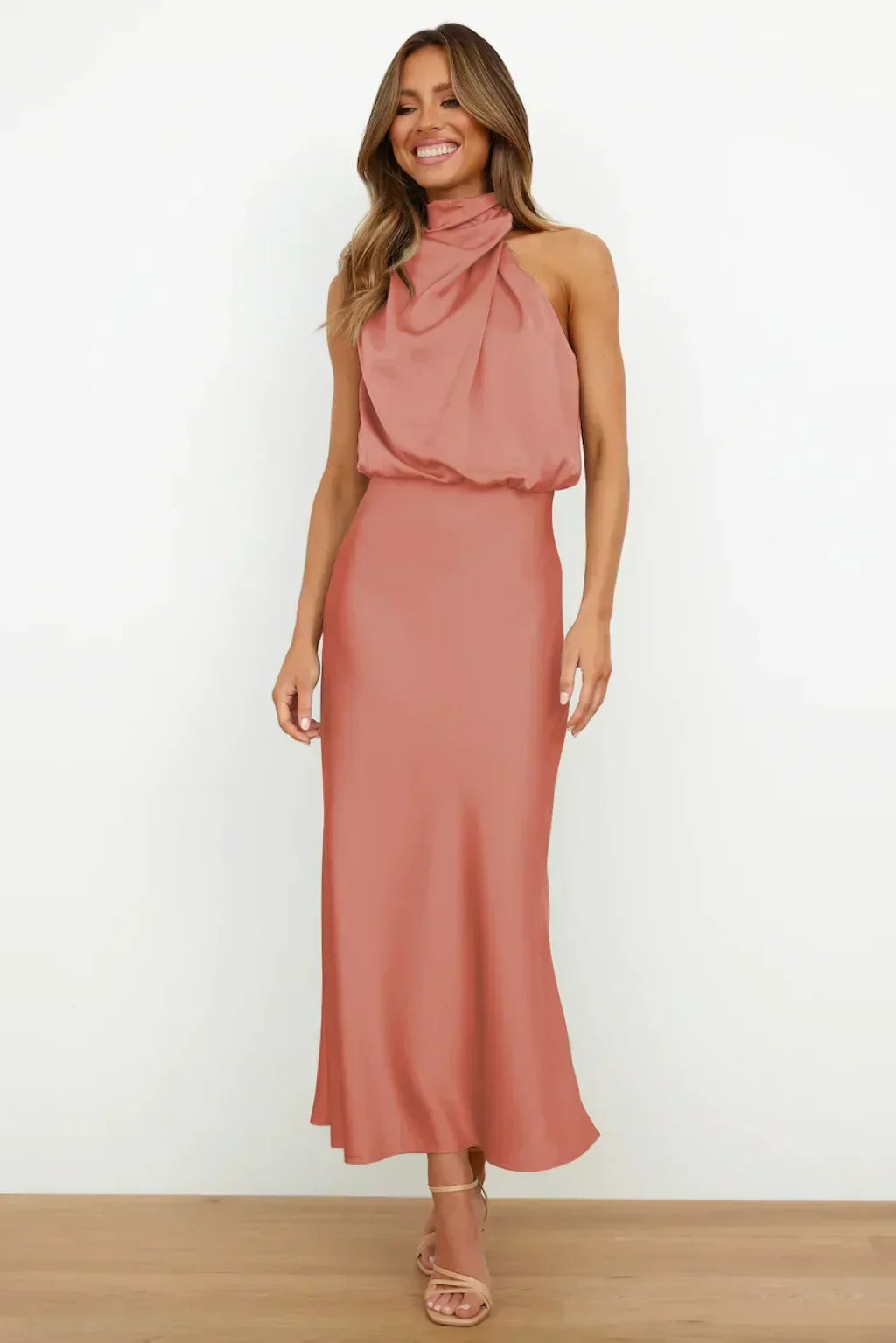 Chic halter neckline of an elegant women's evening gown, perfect for special occasions.
