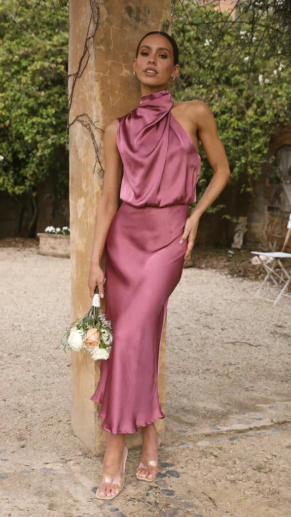 Sophisticated women's midi dress with halter neck, flattering fit for special events.