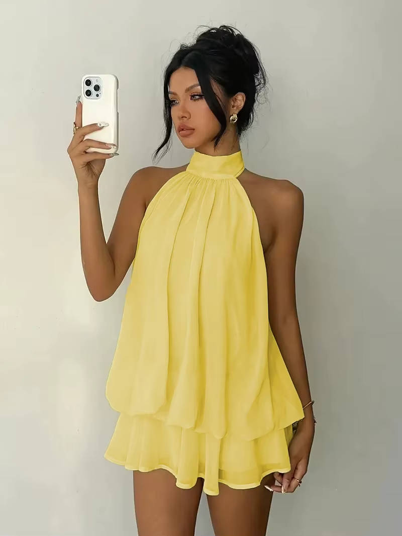 Elegant women's halter mini dress with a chic ruffle hem, perfect for parties & cocktails.