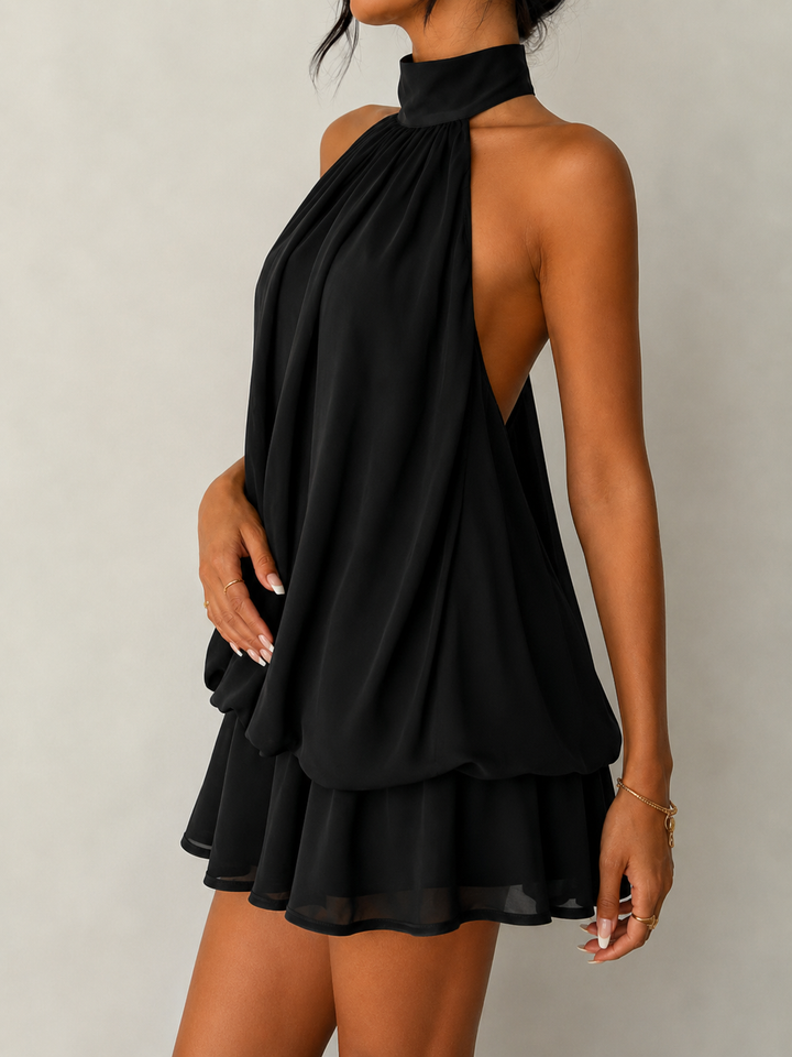 Sophisticated women's halter mini dress with an elegant ruffle hem, perfect for cocktails.