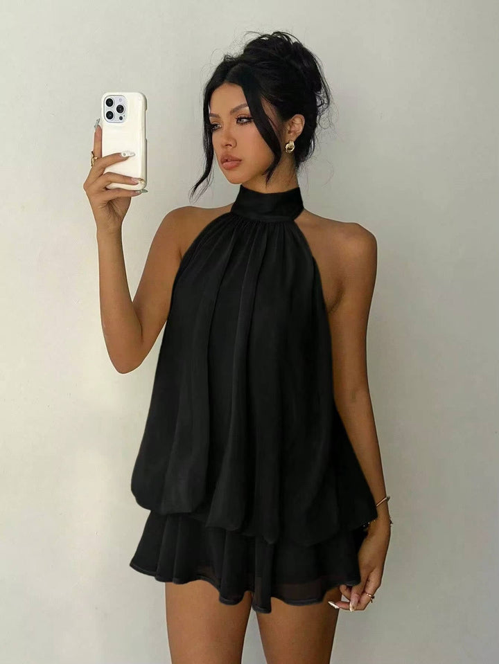 Fashionable women's summer party dress, elegant halter design with a flowy ruffle hem.