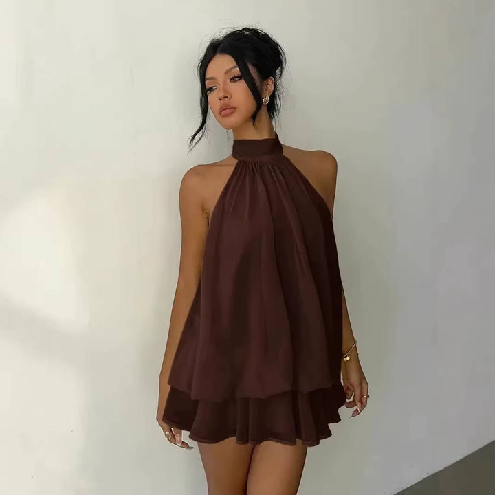 Vibrant women's mini dress, halter style with an elegant ruffle hem, perfect for summer events.