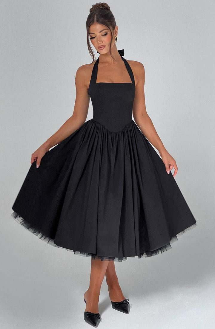 Classic women's midi cocktail dress with a sophisticated halter neck. Ideal for evening events.
