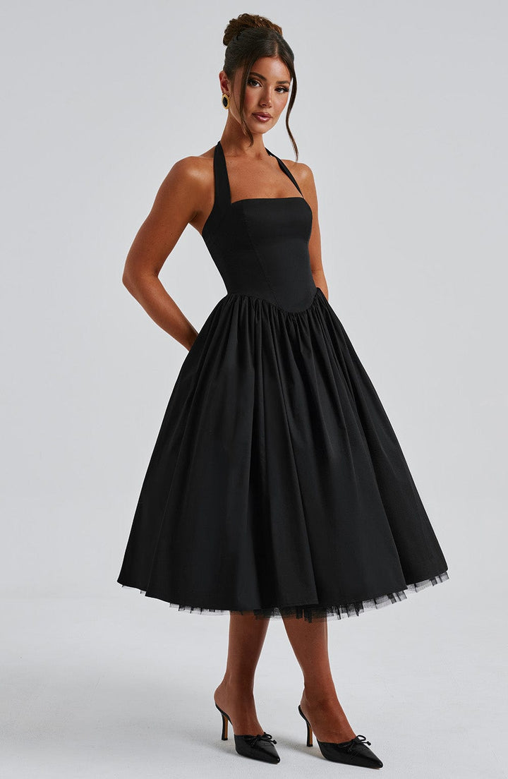 Formal women's halter neck midi dress, showcasing a feminine fit and flare design for any party.