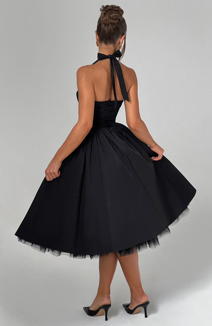 Women's timeless halter neck midi dress, an elegant and feminine choice for any formal occasion.