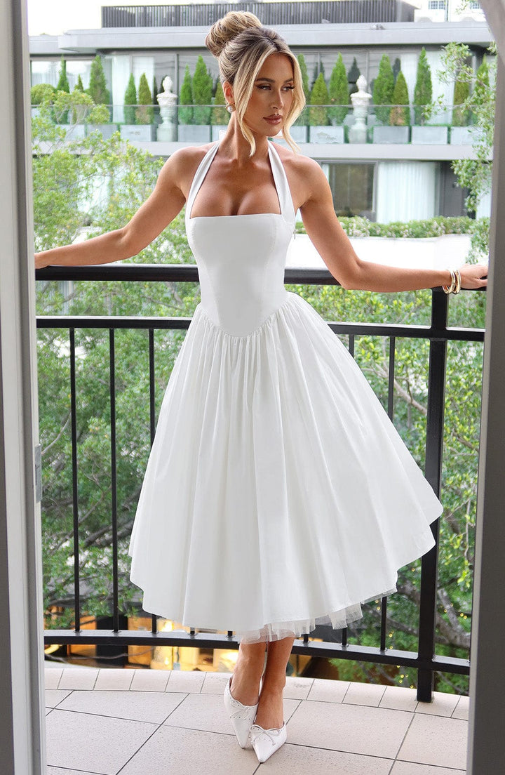 Sophisticated women's midi dress with a chic halter neckline, ideal for formal parties & events.