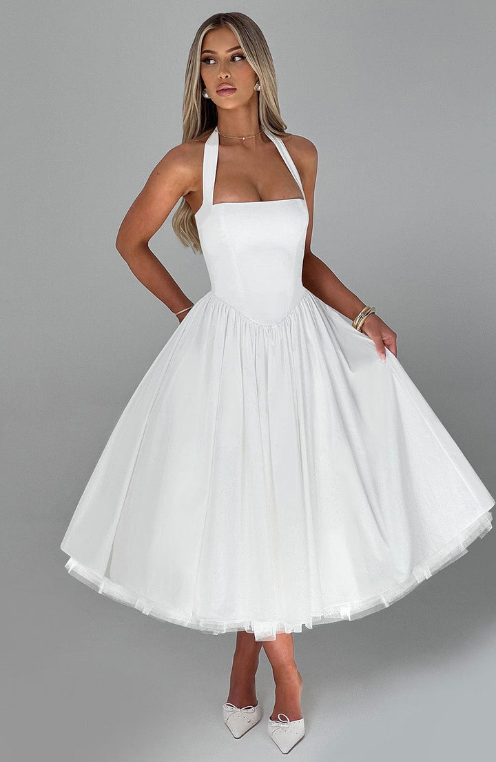 Stylish women's midi party dress with a flattering halter neck and elegant fit and flare design.