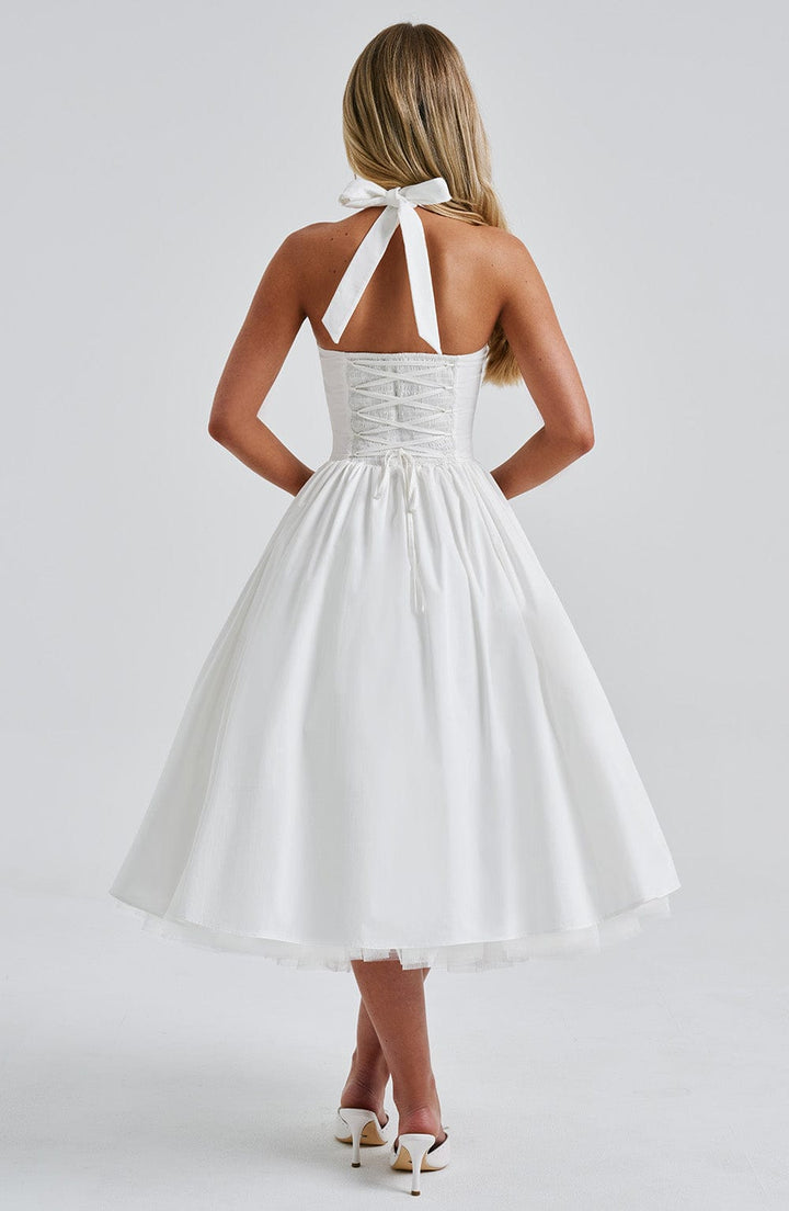 Women's sophisticated halter neck midi dress, a timeless choice for formal events & cocktail parties.