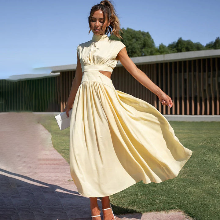 Summer-ready women's midi dress with a sophisticated halter neck and eye-catching side slit feature.
