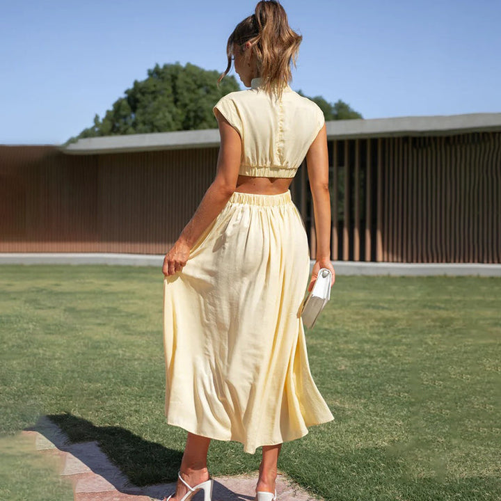 Party-ready women's elegant midi dress, halter neckline, and a daring side slit for a chic look.