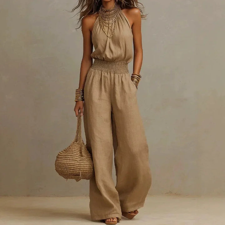 Comfortable women's sleeveless halter neck jumpsuit, wide leg design for effortless elegance.