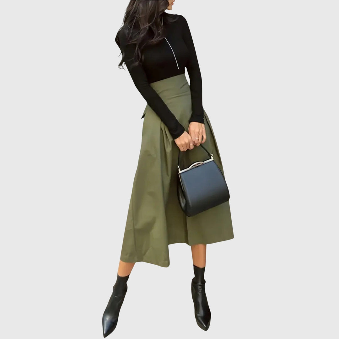 Elegant women's high-waist A-line green midi skirt with delicate pleats, perfect for office or spring casual wear.