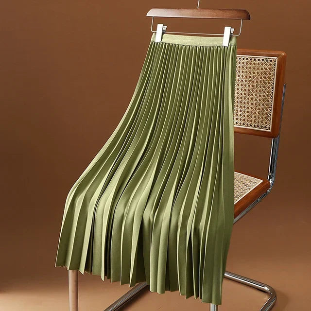 Sophisticated women's pleated midi skirt with a high waist, enhancing any office or casual ensemble.
