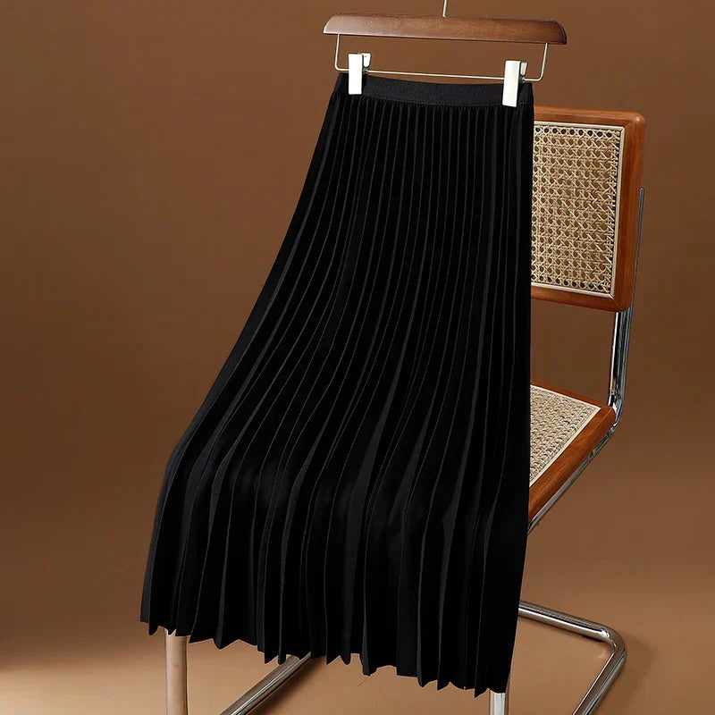 Timeless women's high-waisted pleated midi skirt, a chic and essential piece for feminine apparel.