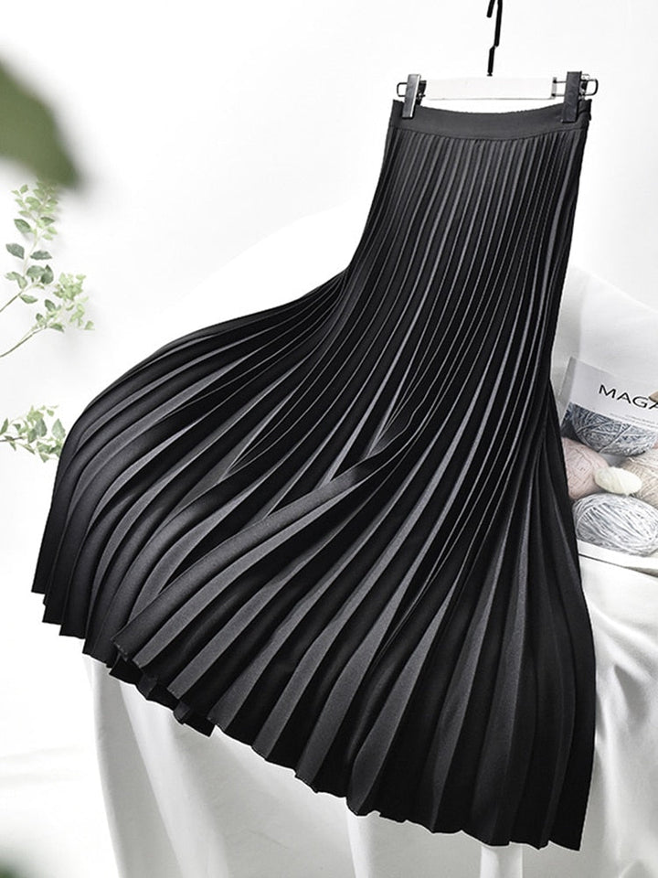 Elegant women's high-waisted pleated midi skirt, perfect for chic formal or casual wear.